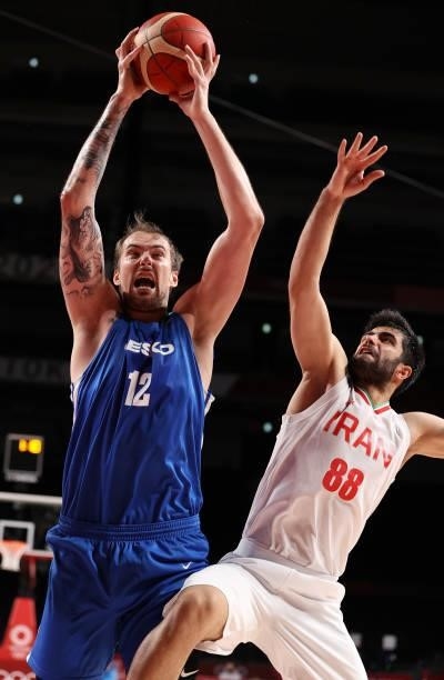 Ondrej Balvin of Team Czech Republic grabs a rebound against Behnam Yakhchalidehkordi of Team Iran during the second half on day two of the Tokyo...