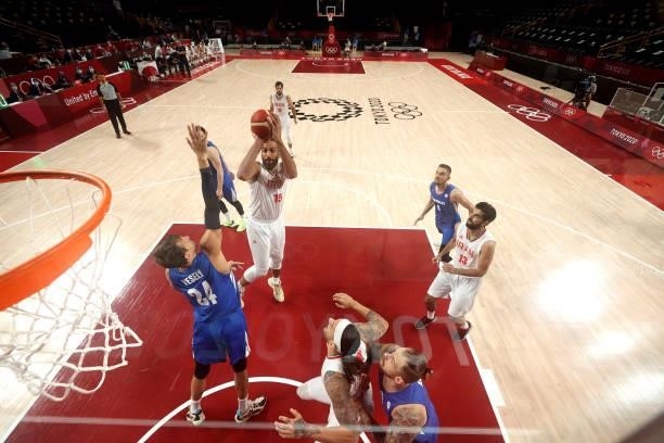 Hamed Haddadi of Team Iran shoots against Jan Vesely of Team Czech Republic during the second half on day two of the Tokyo 2020 Olympic Games at...