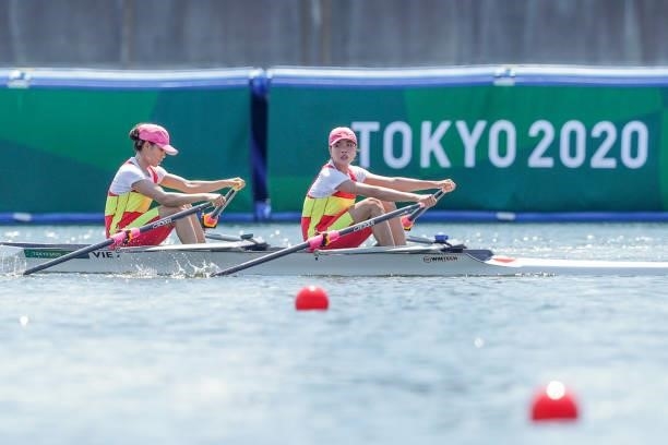 Thi Thao Luong of Vietnam and Thi Hao Dinh of Vietnam compete on Lightweight Women's Double Sculls Repechage 2 during the Tokyo 2020 Olympic Games at...