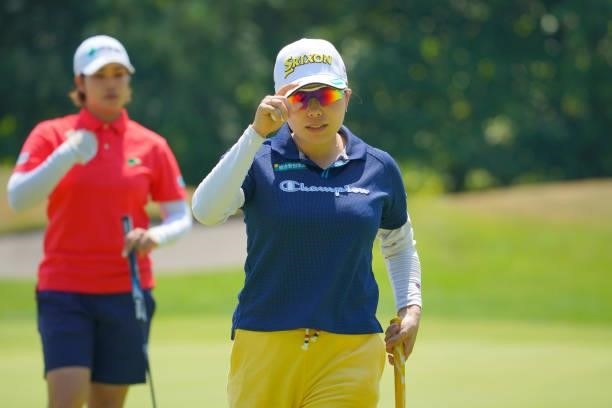 Minami Katsu of Japan acknowledges fans after the birdie on the 8th green during the final round of Daito Kentaku eHeyanet Ladies at Takino Country...