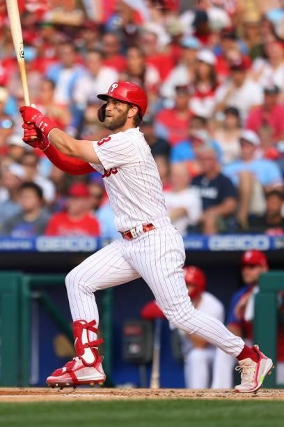 Bryce Harper of the Philadelphia Phillies hits a double against the Atlanta Braves during a game at Citizens Bank Park on July 24, 2021 in...