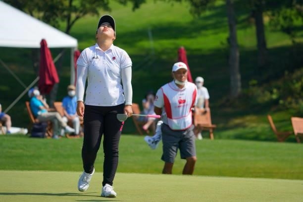 Mao Saigo of Japan shows dejection after missing the par putt on the 18th green during the final round of Daito Kentaku eHeyanet Ladies at Takino...