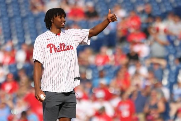 Tyrese Maxey of the Philadelphia 76ers throws out the first pitch before a game between the Atlanta Braves and Philadelphia Phillies at Citizens Bank...