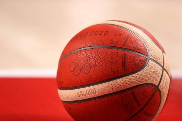 The officail Tokyo 2020 Olympic basketball sits on the court during the first half on day two of the Tokyo 2020 Olympic Games between Italy and...