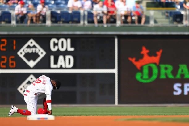 Andrew McCutchen of the Philadelphia Phillies prays before the start of a game against the Atlanta Braves at Citizens Bank Park on July 24, 2021 in...
