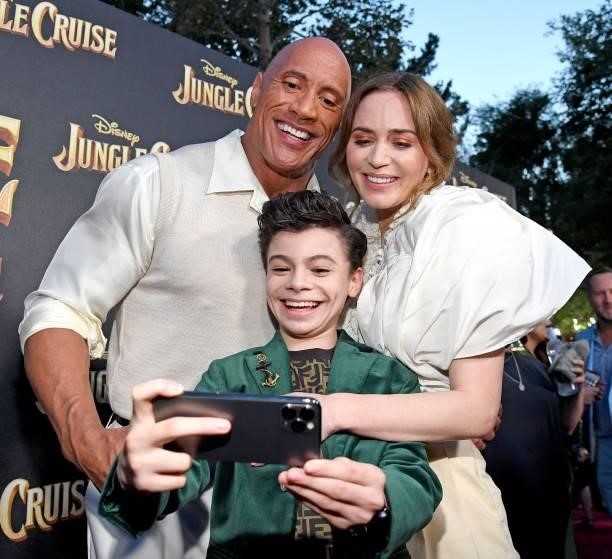 Dwayne Johnson, Raphael Alejandro, and Emily Blunt arrive at the world premiere for JUNGLE CRUISE, held at Disneyland in Anaheim, California on July...