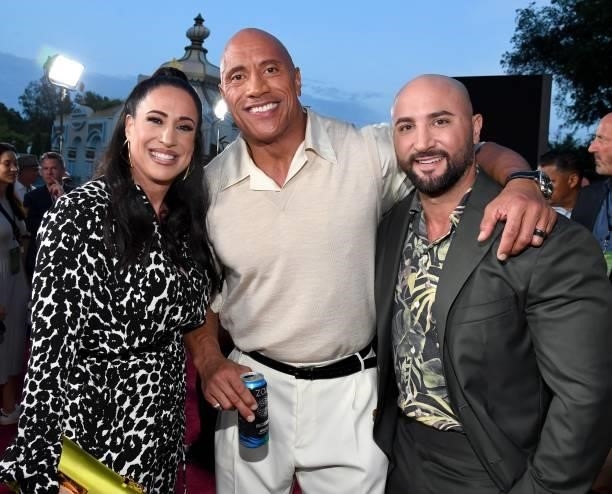 Dany Garcia, Dwayne Johnson, and Dave Rienzi arrives at the world premiere for JUNGLE CRUISE, held at Disneyland in Anaheim, California on July 24,...