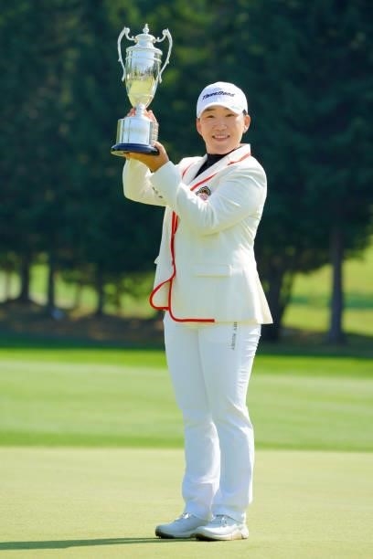 Jiyai Shin of South Korea poses with the trophy after winning the tournament following the final round of Daito Kentaku eHeyanet Ladies at Takino...
