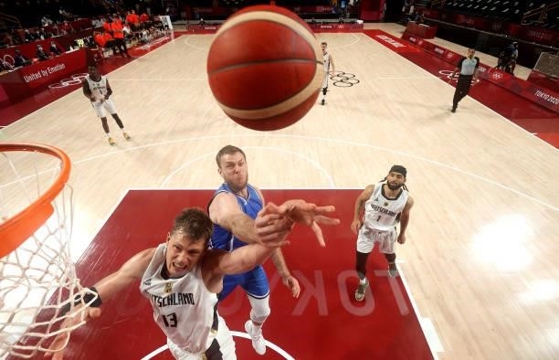Moritz Wagner of Team Germany goes up for a shot against Nicolo Melli of Team Italy during the second half on day two of the Tokyo 2020 Olympic Games...