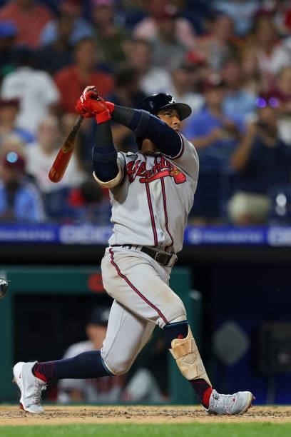 Ozzie Albies of the Atlanta Braves hits a three-run home run during the eighth inning against the Philadelphia Phillies in a game at Citizens Bank...