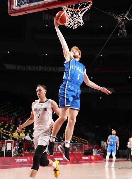 Niccolo Mannion of Team Italy goes up for a shot against Joshiko Saibou of Team Germany during the second half on day two of the Tokyo 2020 Olympic...