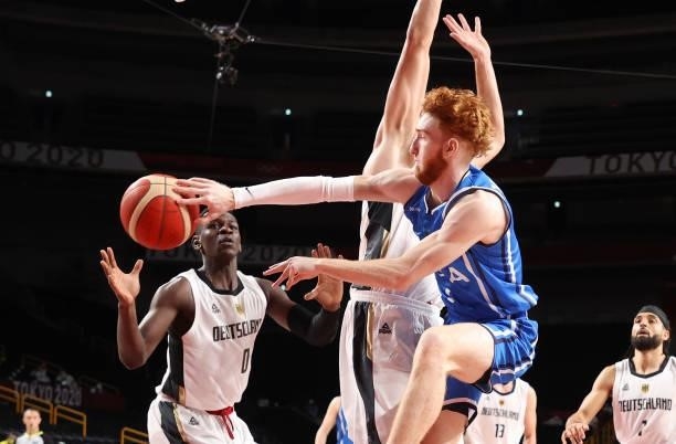 Niccolo Mannion of Team Italy passes against Germany during the second half on day two of the Tokyo 2020 Olympic Games at Saitama Super Arena on July...