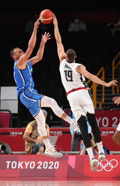 Stefano Tonut of Team Italy shoots against Lukas Wank of Team Germany during the first half on day two of the Tokyo 2020 Olympic Games at Saitama...