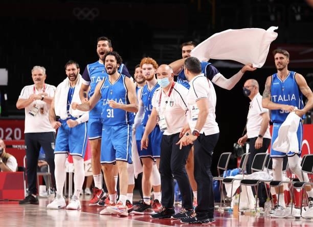 Members of team Italy celebrate against Germany during the second half on day two of the Tokyo 2020 Olympic Games at Saitama Super Arena on July 25,...