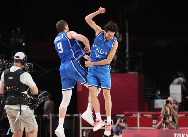 Nicolo Melli and Michele Vitali of Team Italy celebrate a win against Germany during the second half on day two of the Tokyo 2020 Olympic Games at...