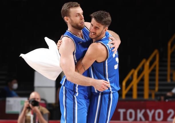 Nicolo Melli of Team Italy and Achille Polonara of Team Italy celebrate a win against Germany on day two of the Tokyo 2020 Olympic Games at Saitama...