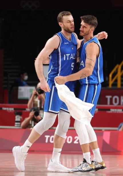 Nicolo Melli of Team Italy and Achille Polonara of Team Italy celebrate a win against Germany on day two of the Tokyo 2020 Olympic Games at Saitama...