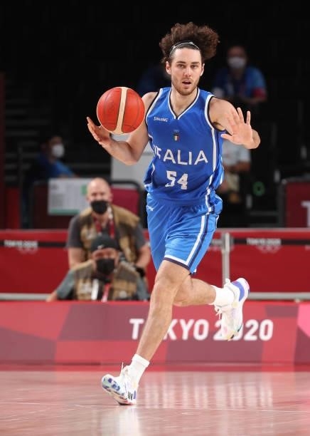 Alessandro Pajola of Team Italy brings the ball up court against Germany during the second half on day two of the Tokyo 2020 Olympic Games at Saitama...