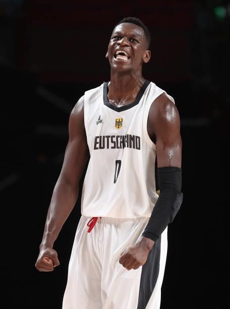 Isaac Bonga of Team Germany celebrates a basket against Italy during the second half on day two of the Tokyo 2020 Olympic Games at Saitama Super...