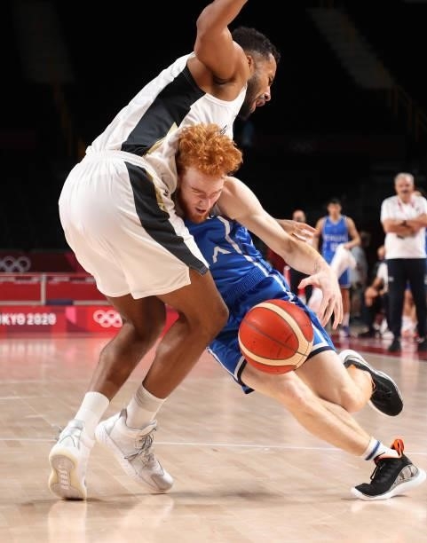 Niccolo Mannion of Team Italy runs into Johannes Thiemann of Team Germany during the second half on day two of the Tokyo 2020 Olympic Games at...