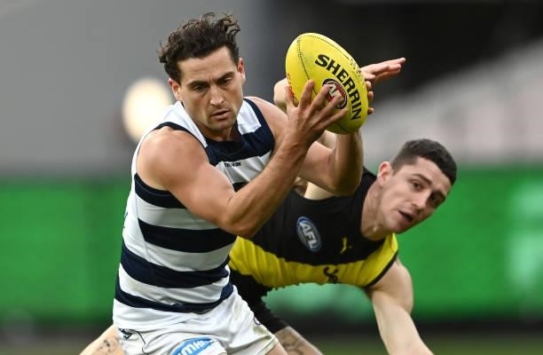Luke Dahlhaus of the Cats marks during the round 19 AFL match between Geelong Cats and Richmond Tigers at Melbourne Cricket Ground on July 25, 2021...