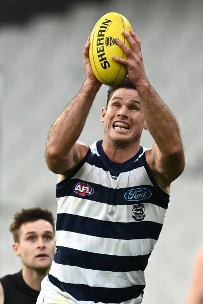 Tom Hawkins of the Cats marks during the round 19 AFL match between Geelong Cats and Richmond Tigers at Melbourne Cricket Ground on July 25, 2021 in...