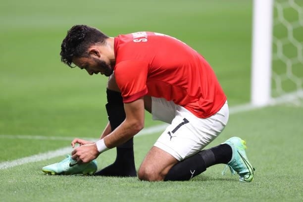 Salah Mohsen of Team Egypt removes his boot during the Men's First Round Group C match between Egypt and Argentina on day two of the Tokyo 2020...
