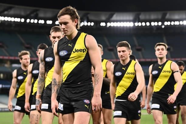 Rhyan Mansell and his Tigers team mates look dejected after losing the round 19 AFL match between Geelong Cats and Richmond Tigers at Melbourne...