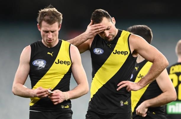 Dylan Grimes and Toby Nankervis of the Tigers look dejected after losing the round 19 AFL match between Geelong Cats and Richmond Tigers at Melbourne...