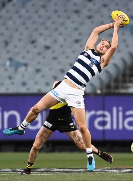 Jake Kolodjashnij of the Cats marks during the round 19 AFL match between Geelong Cats and Richmond Tigers at Melbourne Cricket Ground on July 25,...