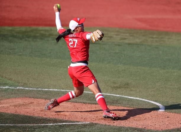 Pitcher Miu Goto of Team Japan pitches in seventh inning against Team Canada during the Softball Opening Round on day two of the Tokyo 2020 Olympic...