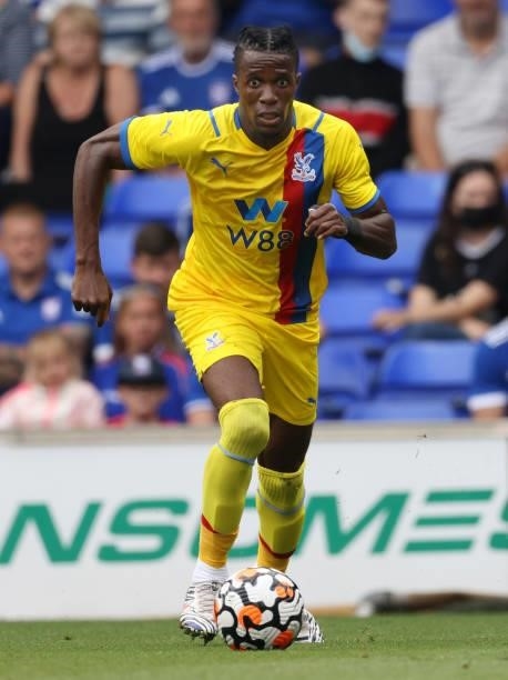 Wilfried Zaha of Crystal Palace runs with the ball during the pre-season friendly match between Ipswich Town and Crystal Palace at Portman Road on...
