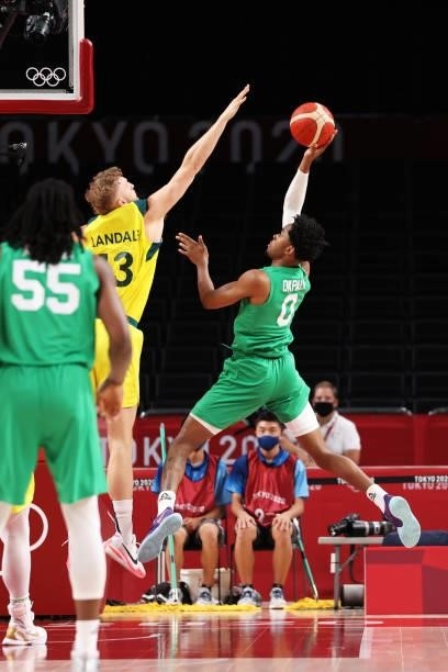 Chikezie Okpala of Team Nigeria takes a shot over Jock Landale of Team Australia during the first half on day two of the Tokyo 2020 Olympic Games at...