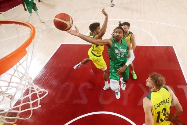 Nnamdi Vincent of Team Nigeria drives to the basket against Australis during the first half on day two of the Tokyo 2020 Olympic Games at Saitama...