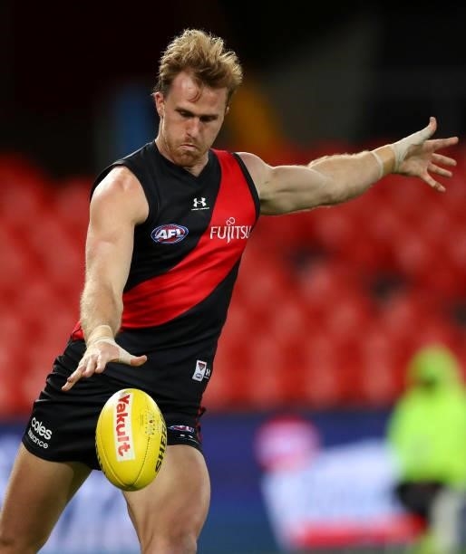 James Stewart of Essendon kicks the ball during the round 19 AFL match between Essendon Bombers and Greater Western Sydney Giants at Metricon Stadium...