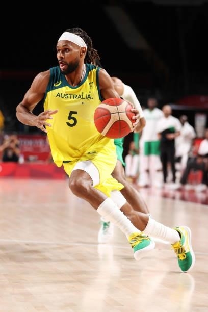 Patty Mills of Team Australia drives to the basket against Nigeria during the first half on day two of the Tokyo 2020 Olympic Games at Saitama Super...