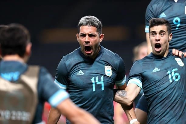 Facundo Medina of Team Argentina celebrates with teammate Martin Payero after scoring their side's first goal during the Men's First Round Group C...