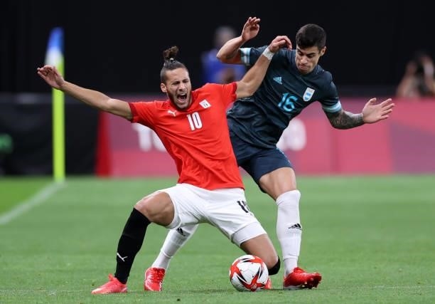 Ramadan Sobhi of Team Egypt is challenged by Martin Payero of Team Argentina during the Men's First Round Group C match between Egypt and Argentina...
