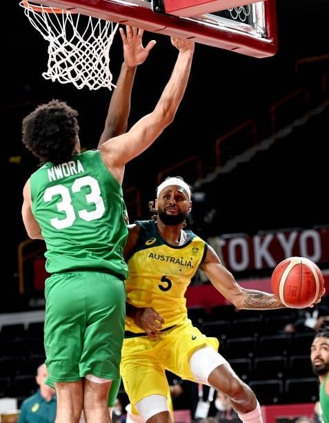 Patty Mills of Australia drives to the basket during the preliminary rounds of the Men's Basketball match between Australia and Nigeria on day two of...