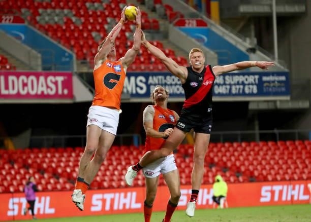 Sam Taylor of the GWS Giants marks the ball during the round 19 AFL match between Essendon Bombers and Greater Western Sydney Giants at Metricon...
