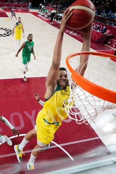 Dante Exum of Team Australia dunks against Nigeria in the first half of their Men's Preliminary Round Group B game on day two of the Tokyo 2020...