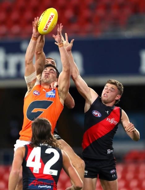 Tim Taranto of the GWS Giants marks the ball during the round 19 AFL match between Essendon Bombers and Greater Western Sydney Giants at Metricon...