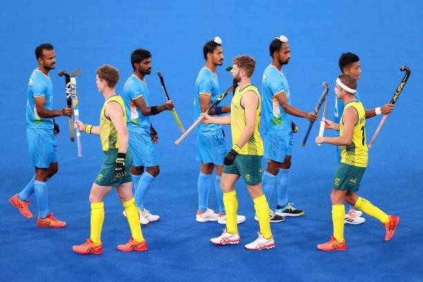 India and Australia players interact ahead of the Men's Preliminary Pool A match between India and Australia on day two of the Tokyo 2020 Olympic...