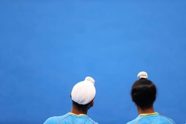 Mandeep Singh and Dilpreet Singh of Team India look on during the Men's Preliminary Pool A match between India and Australia on day two of the Tokyo...