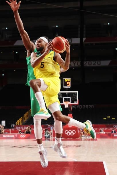 Patty Mills of Team Australia drives to the basket against Nigera in the first half of the Men's Preliminary Round Group B game on day two of the...
