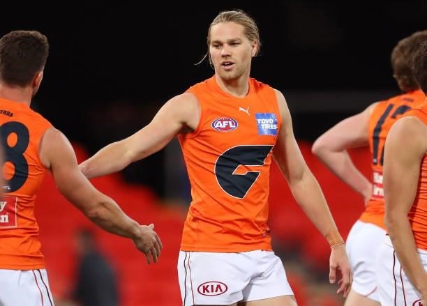 Harry Himmelberg of the GWS Giants celebrates his goal during the round 19 AFL match between Essendon Bombers and Greater Western Sydney Giants at...