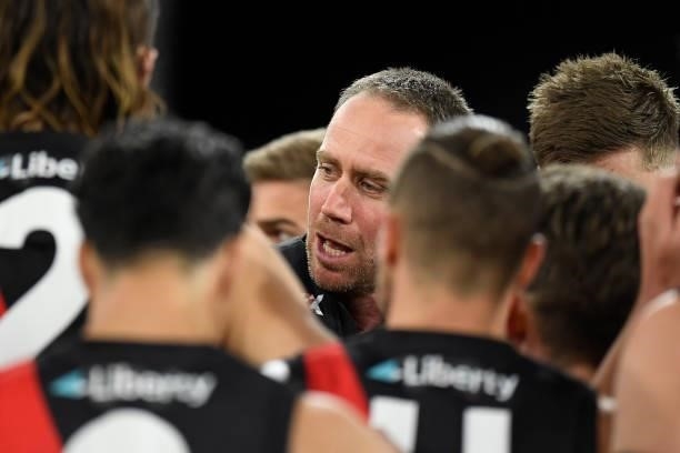 Essendon Bombers coach Ben Rutten speaks to his players during the round 19 AFL match between Essendon Bombers and Greater Western Sydney Giants at...