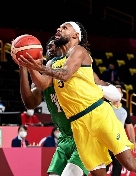Patty Mills of Australia gets past the defence during the preliminary rounds of the Men's Basketball match between Australia and Nigeria on day two...
