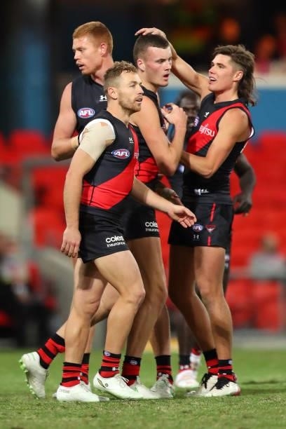 Nik Cox of Essendon celebrates his goal during the round 19 AFL match between Essendon Bombers and Greater Western Sydney Giants at Metricon Stadium...
