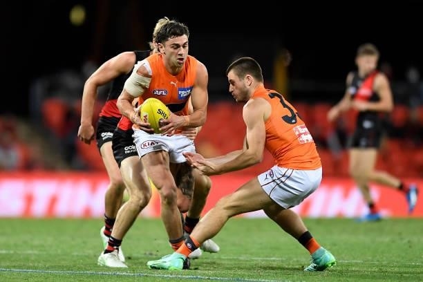 Tim Taranto of the Giants in action during the round 19 AFL match between Essendon Bombers and Greater Western Sydney Giants at Metricon Stadium on...